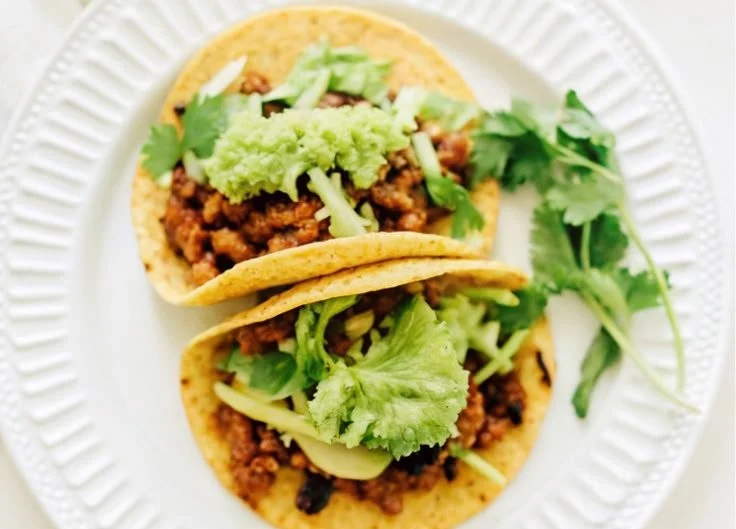 Quinoa and black bean tacos served with fresh toppings